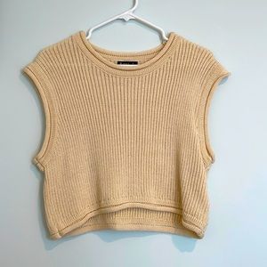This soft simplistic cream sweater is the perfect mix of preppy and dressy